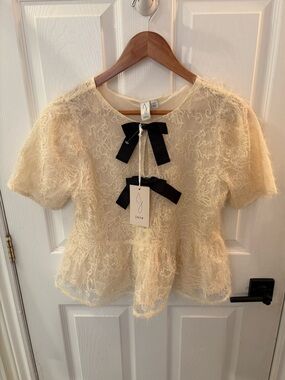 Joie Cream Lace Peplum Top with Black Bow Accents